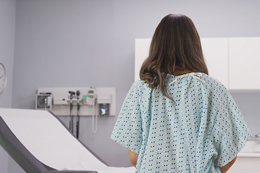 Internal Medicine Patient Wearing Hospital Gown in a Clinic in Bayonet Point Florida