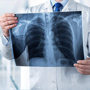 Bayonet Point Doctor Looking at Xray Results of Patient Availing Primary Care Services